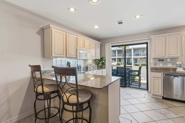 Fridge, microwave, oven, stovetop - Gulf Winds 28, Paradise condo with pool access, private balcony and patio (Miramar Beach)