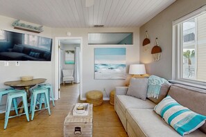 TV, offices - Cozy coastal condo with shared pool and close to beach access (Panama City Beach)