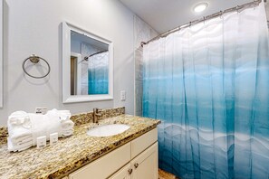 Shower, towels - Brightly updated home near the sound with large patio, chef's kitchen, & W/D (Navarre)