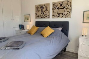2 dormitorios, tabla de planchar con plancha, wifi gratis y ropa de cama
