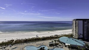 A resort with a swimming pool, beach access, and a view of the ocean. - Terrific condo in beachfront location with pool, central AC & balcony (Panama City Beach)