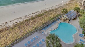 A resort with a pool, beach, and ocean view. - Gorgeous beachfront condo, shared & and beach access (Panama City Beach)