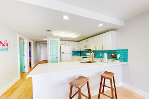 Fridge, microwave, oven, stovetop - Gulf-view condo near beach with balcony, W&D, pool, gym, & WiFi - snowbirds OK (Miramar Beach)