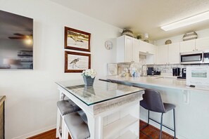 Fridge, microwave, oven, stovetop - Fourth-floor, Caribbean corner condo with ocean views, pool, & hot tub (Santa Rosa Beach)