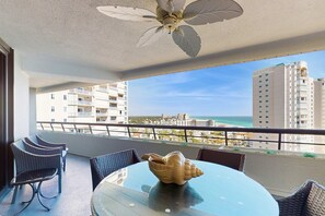 Outdoor dining - Gulf-view resort condo with pools, hot tubs, balcony, WiFi, W&D, & AC (Miramar Beach)