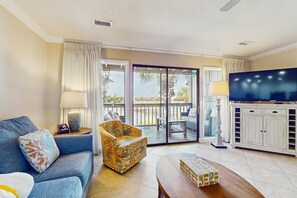 TV, offices - Lakefront condo near the beach with shared pool & two balconies - snowbird friendly (Miramar Beach)