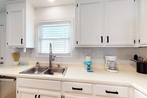 Fridge, microwave, oven, stovetop - Partial Gulf-view getaway with deck, full kitchen, washer&dryer, & central AC (Panama City Beach)