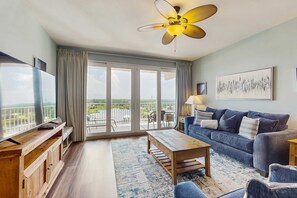 TV, offices - Gorgeous coastal condo with shared pool and private patio (Panama City Beach)