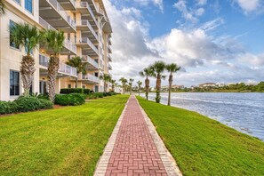 Property grounds - Sunset-view dog-friendly condo w/ balcony overlooking water, beach access, pool & hot tub (Panama City Beach)