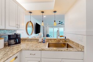Fridge, microwave, oven, stovetop - Oceanfront condo with wrap-around balcony, shared pool, tennis, WiFi (Panama City Beach)