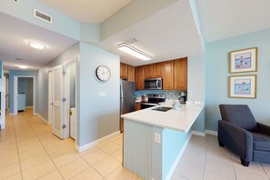 Fridge, microwave, oven, stovetop - Stunning condo with Gulf view, balcony, hot tub, & pool (Panama City Beach)