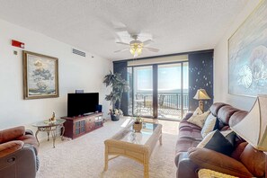 TV, offices - Beachfront Condo with Gulf-View, Balcony, with Shared Pool, & Gym (Navarre Beach)