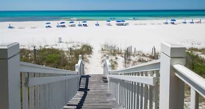 Lakefront dog-friendly condo with water views, pool, hot tub & beach access
