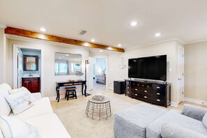 TV, offices - Three-Story Beachfront Gem w/ a Private Balcony, Ocean View, & Full Kitchen (Navarre Beach)