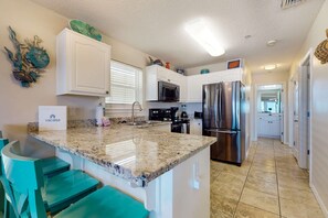 Fridge, microwave, oven, stovetop - Bright condo with shared pool, beach access & central location (Navarre Beach)