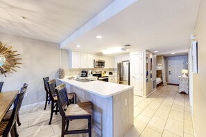 Fridge, microwave, oven, stovetop - Updated 1st-floor condo with large private balcony, pool, grills, firepit, & gym (Miramar Beach)