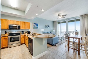 Fridge, microwave, oven, stovetop - Stunning top-floor condo with balcony, pool, & beach access - great location (Fort Walton Beach)