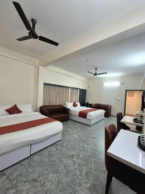 Deluxe Quadruple Room, Garden View | Desk, laptop workspace, free WiFi - NK GUEST HOUSE (Guwahati)