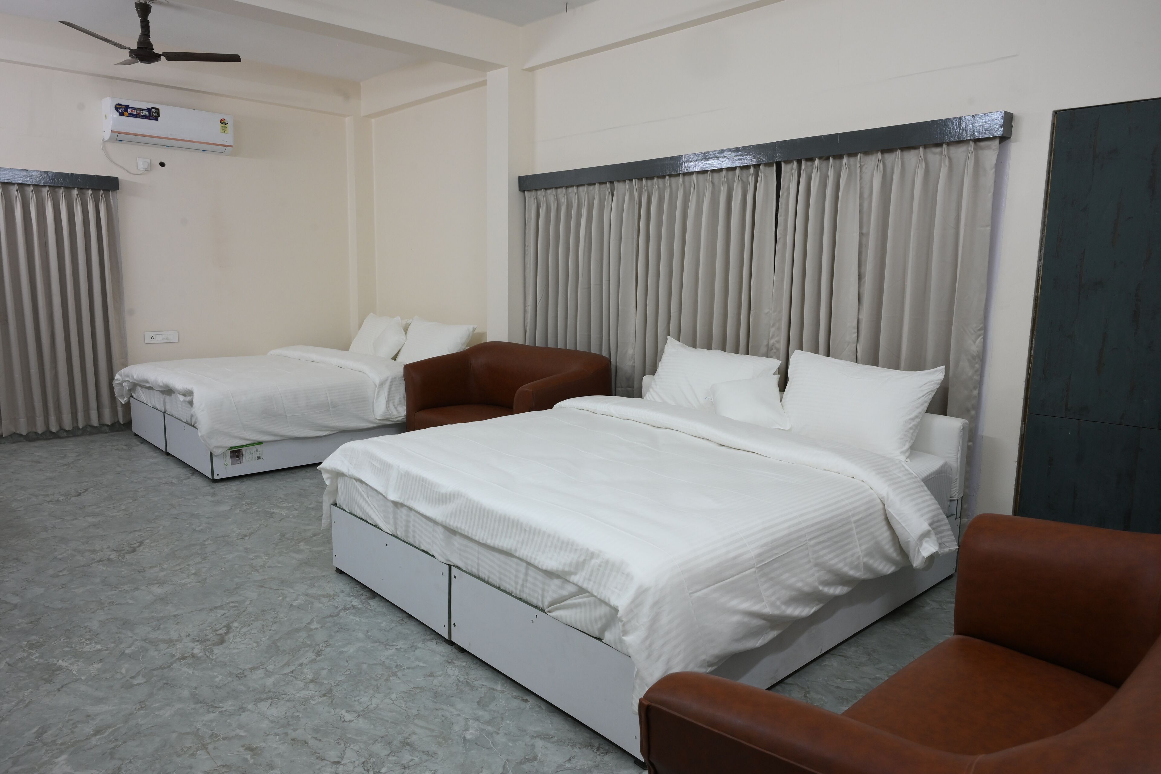 Deluxe Quadruple Room, Garden View | Desk, laptop workspace, free WiFi