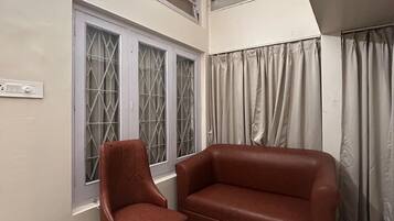 Deluxe Double Room, Garden View | Balcony