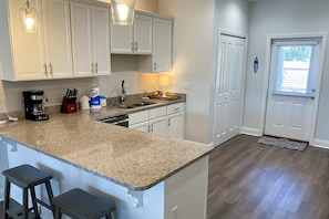 Fridge, microwave, oven, stovetop - Stylish ocean-area home with generous space and short walk to the beach (Mexico Beach)