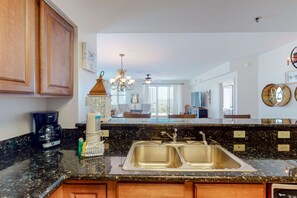 Fridge, microwave, oven, stovetop - Spacious & well-equipped condo with partial ocean views, shared pool, gym (Miramar Beach)
