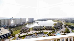 A high-rise hotel with a marina and water views. - Spacious 3 Bedroom Condo with Beach Views and Resort Pool Access (Miramar Beach)