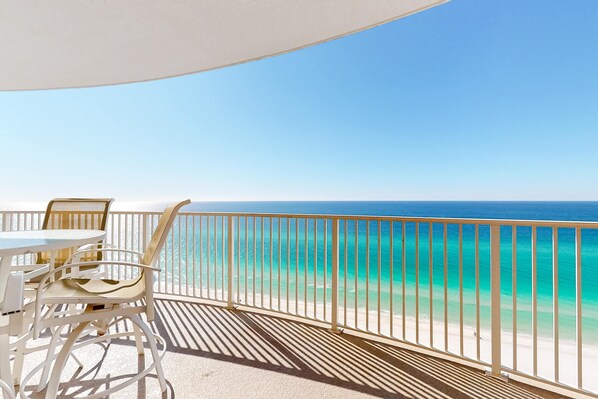 Outdoor dining - Oceanfront condo with epic gulf view, shared pool & hot tub, free WiFi, & W/D (Panama City Beach)