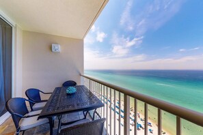 Outdoor dining - Gorgeous beachfront condo with beach access, 4 pools, hot tub, ocean views (Panama City Beach)