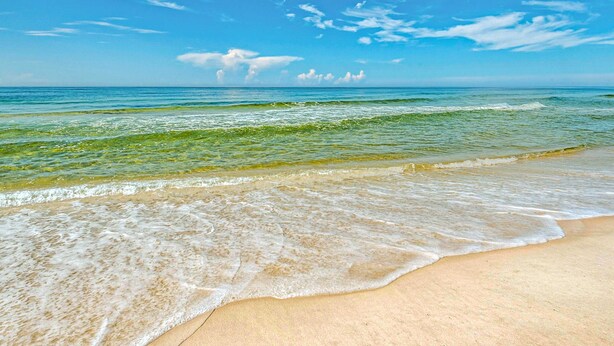 A beach with clear blue water and a sandy shore. - Lovely Two-Story Home with Porches, Access to Pool & Dock (Inlet Beach)