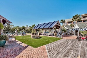 Outdoor dining - Elegant condo with 2 community pools, hot tub, & beach access across the road (Seacrest)
