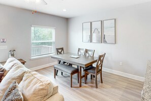 Dining - Inviting townhouse with golf nearby, pool, central AC, W&D, working desk & chair (Panama City Beach)