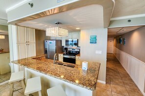 Fridge, microwave, oven, stovetop - Exquisite beachfront condo with pool, hot tub, balcony, central AC, & W/D (Panama City Beach)