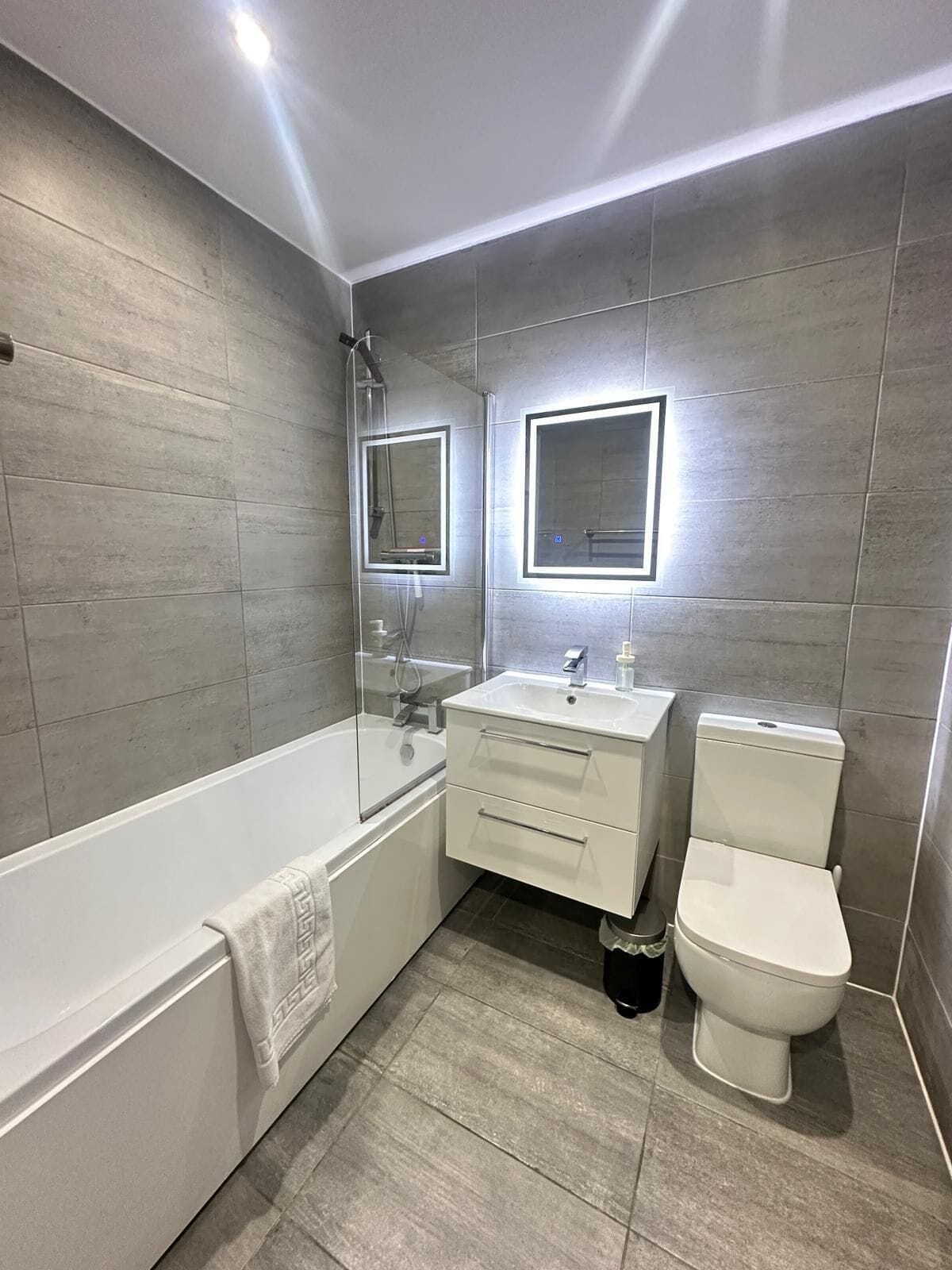 Hair dryer, towels, soap, toilet paper