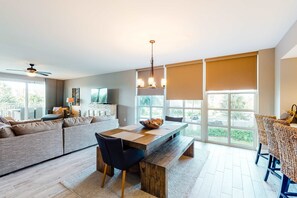 TV, offices - Beachy, second floor condo with pool views, central AC, and private gas grill (Destin)