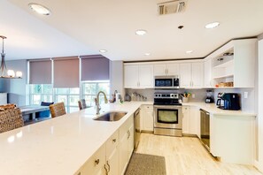 Fridge, microwave, oven, stovetop - Beachy, second floor condo with pool views, central AC, and private gas grill (Destin)