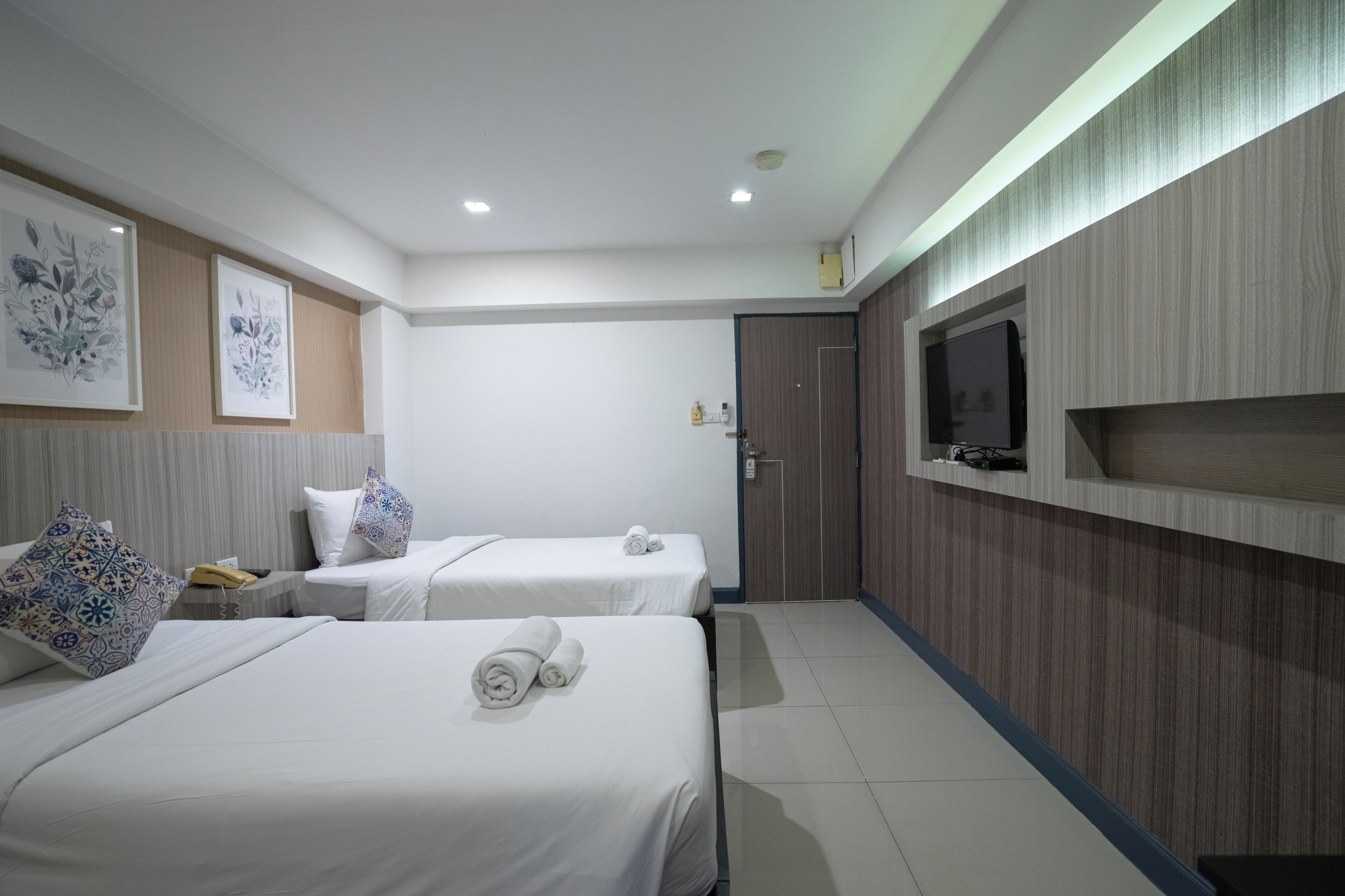 Chambre avec lits jumeaux | Système d’insonorisation, accès au Wi-Fi (inclus)