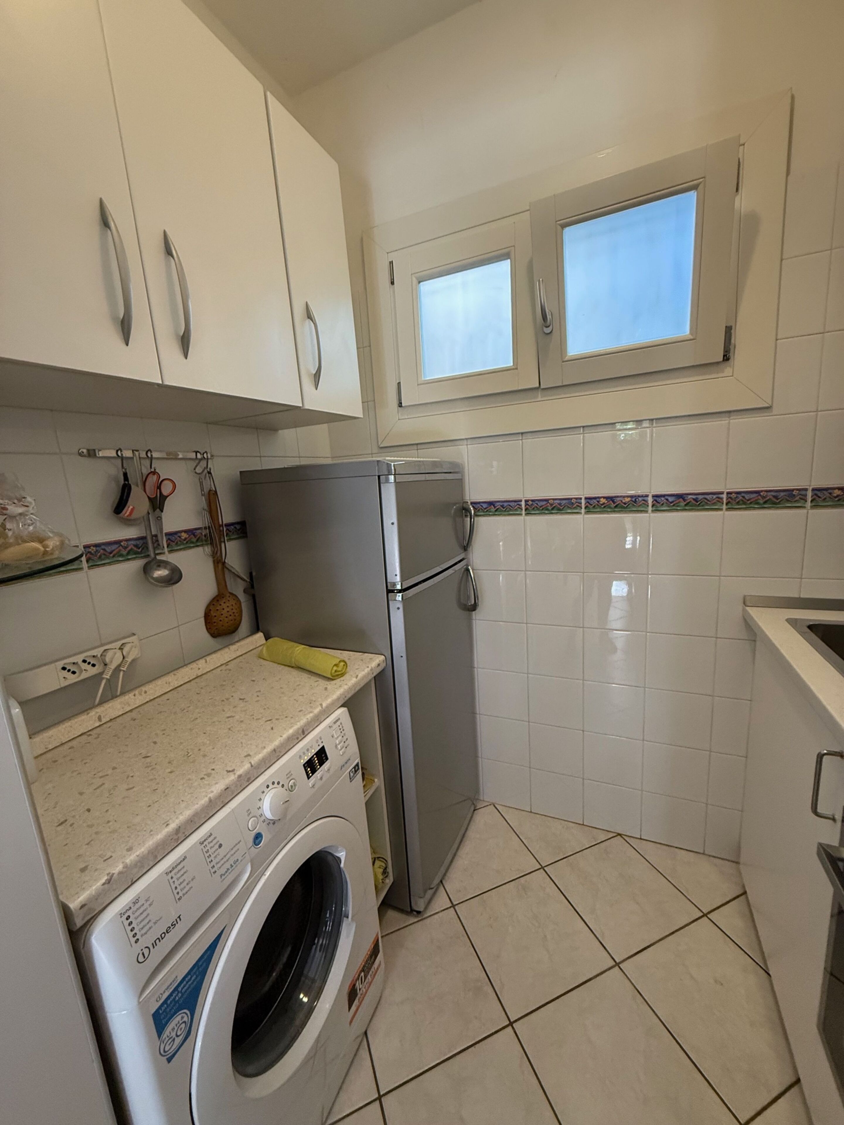 Appartamento, 2 camere da letto, patio, vista giardino | Lavanderia