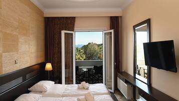 Standard Room, Sea View | Blackout drapes, iron/ironing board, free WiFi