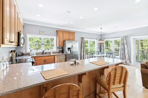 Fridge, microwave, oven, stovetop - Tree-lined home with deck and AC - 1 block from the beach, Eastern Lake, and 30A (Santa Rosa Beach)