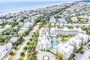 Exterior - Chic condo steps from beach with patio, W/D, AC, and resort-style pool and gym (Inlet Beach)