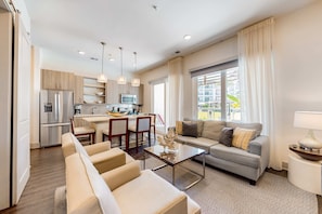 TV - Chic condo steps from beach with patio, W/D, AC, and resort-style pool and gym (Inlet Beach)