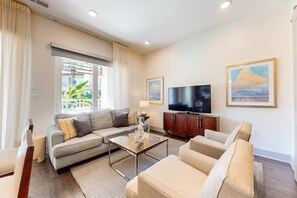 TV - Chic condo steps from beach with patio, W/D, AC, and resort-style pool and gym (Inlet Beach)