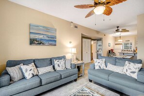 TV, offices - Cozy coastal condo with pool, fast WiFi, central AC, & easy beach access (Pensacola Beach)