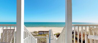 Upscale beachfront home with private hot tub, grill, on-site pools, gym, dogs OK