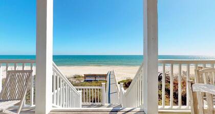 Upscale beachfront home with private hot tub, grill, on-site pools, gym, dogs OK