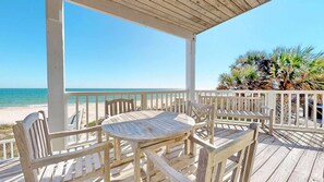 Outdoor dining - Upscale beachfront home with private hot tub, grill, on-site pools, gym, dogs OK (St. George Island)