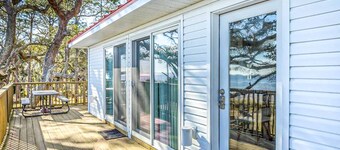 Dog-friendly home with lovely water view, roomy deck, fast WiFi, central AC, W&D