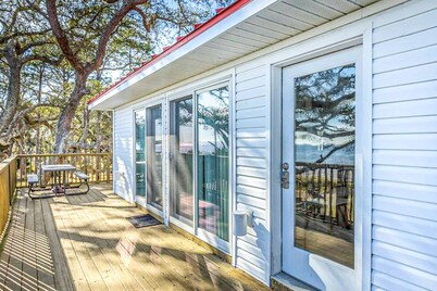 Dog-friendly home with lovely water view, roomy deck, fast WiFi, central AC, W&D