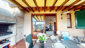Outdoor dining - La Rocca Di Manerba relaxing pool By Bookinggarda (Manerba del Garda)